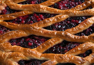 Delicious currant pie as background, closeup. Top view