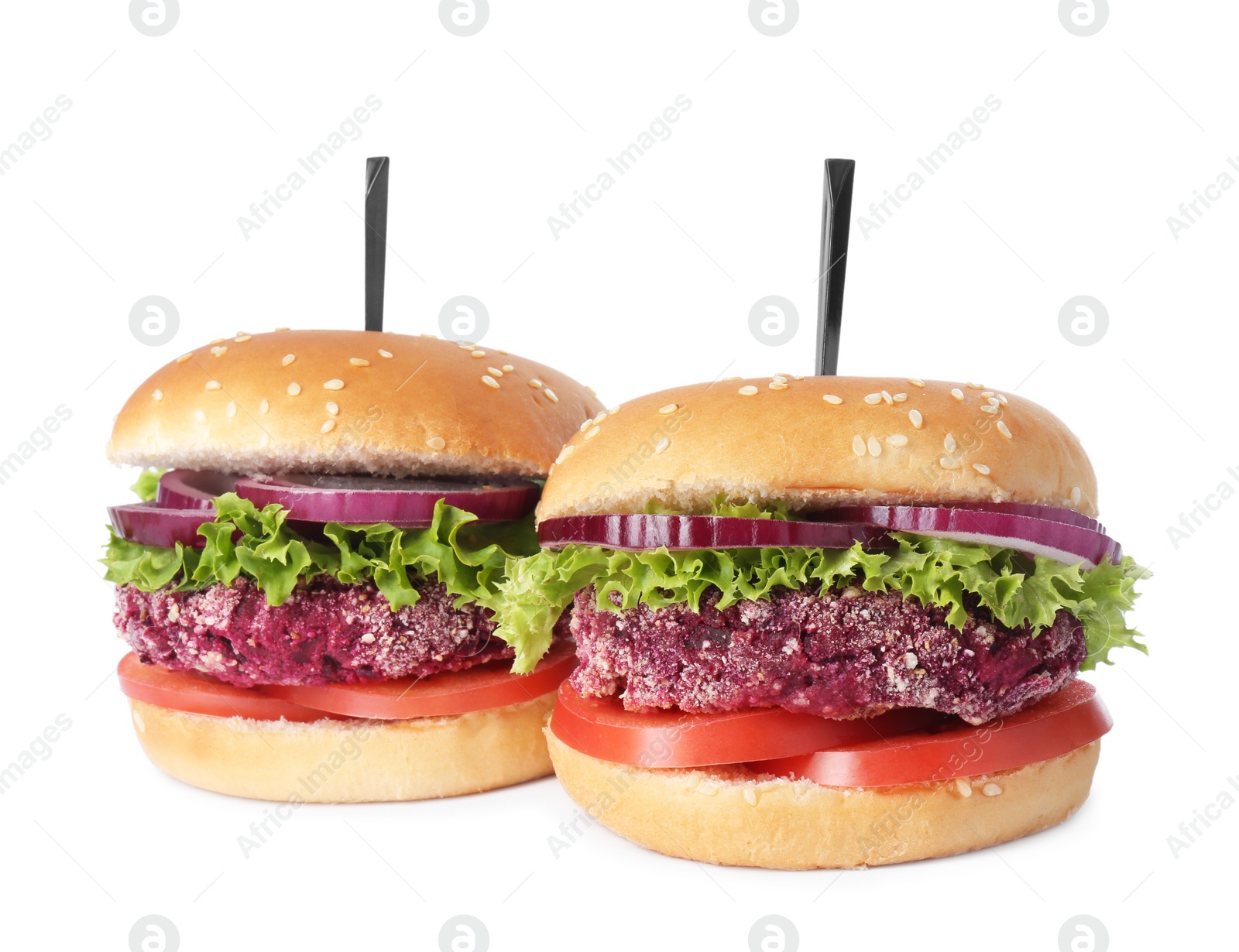 Photo of Tasty vegetarian burgers with beet patties isolated on white
