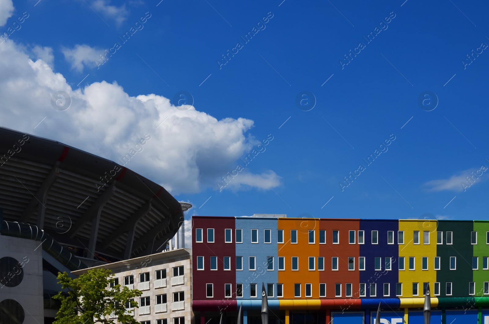 Photo of Airplane in sky over city on sunny day