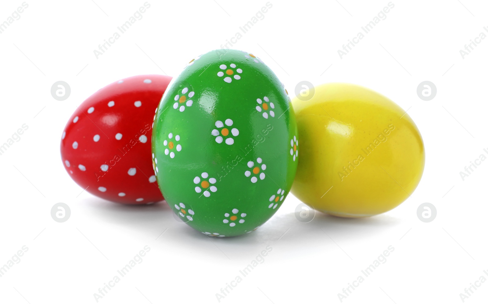 Photo of Decorated Easter eggs on white background. Festive tradition