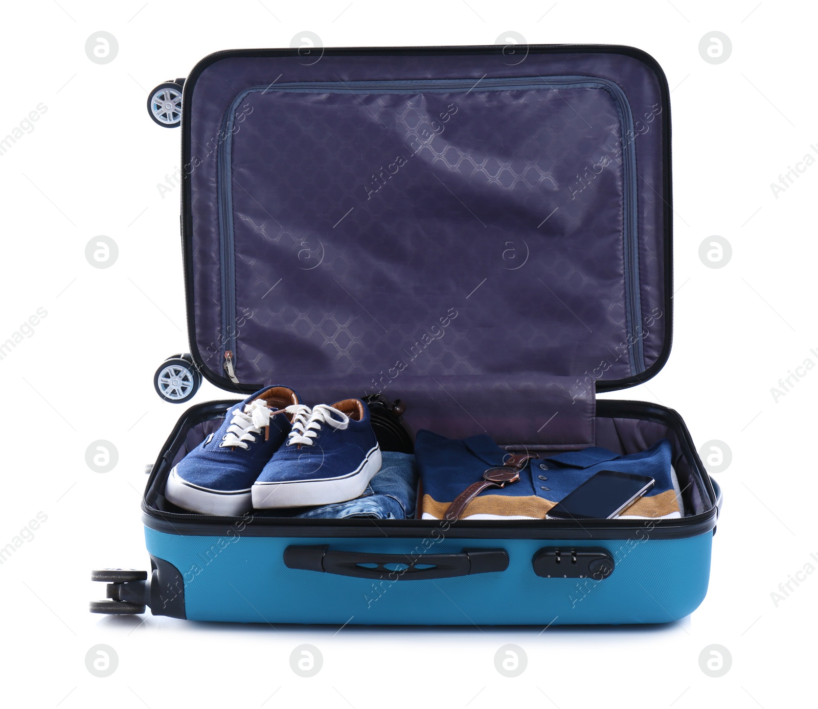 Photo of Open suitcase packed for travelling on white background