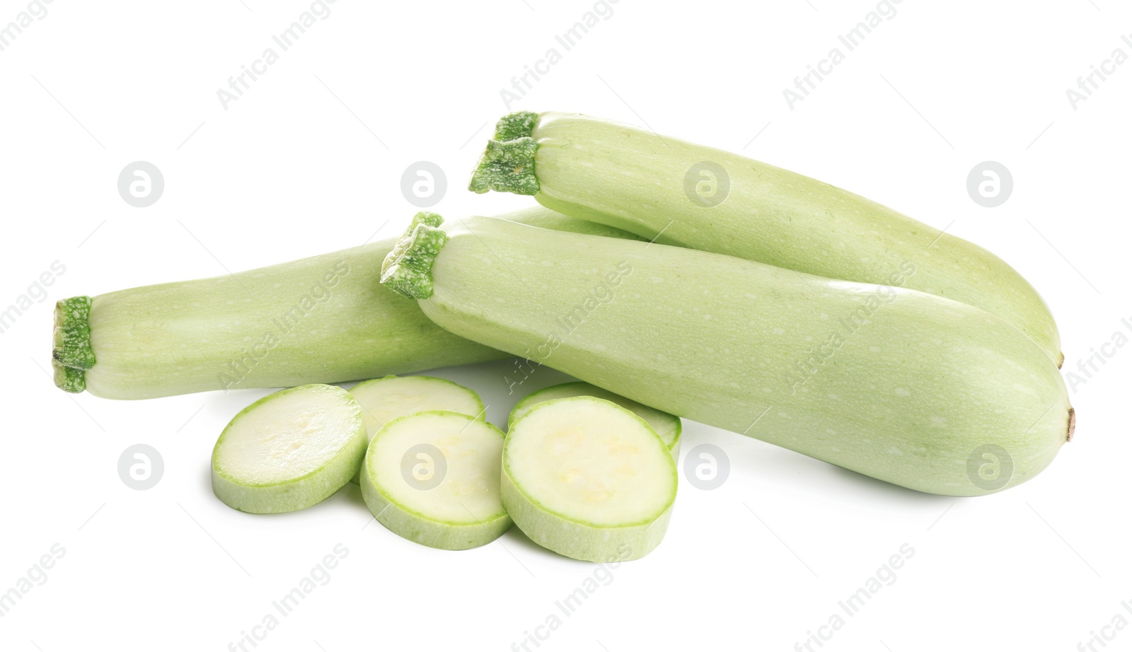 Photo of Fresh ripe green zucchinis isolated on white