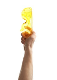 Man holding protective goggles on white background. Construction tools