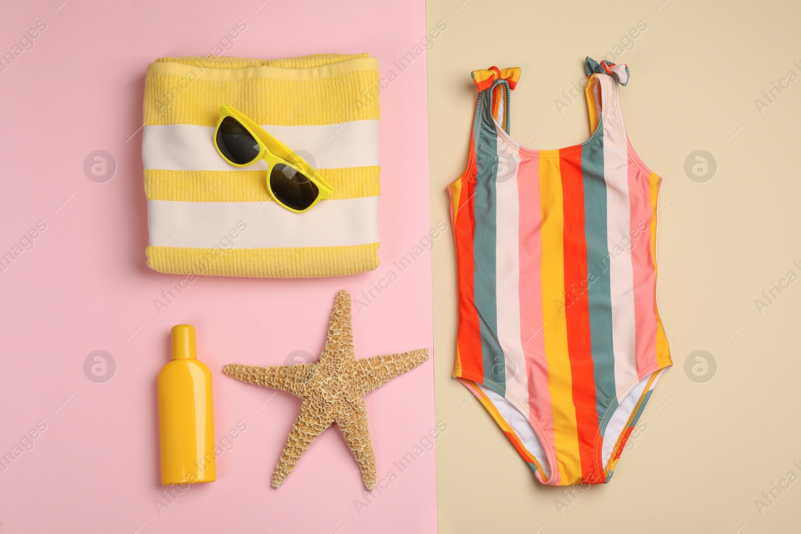 Photo of Flat lay composition with beach objects on color background