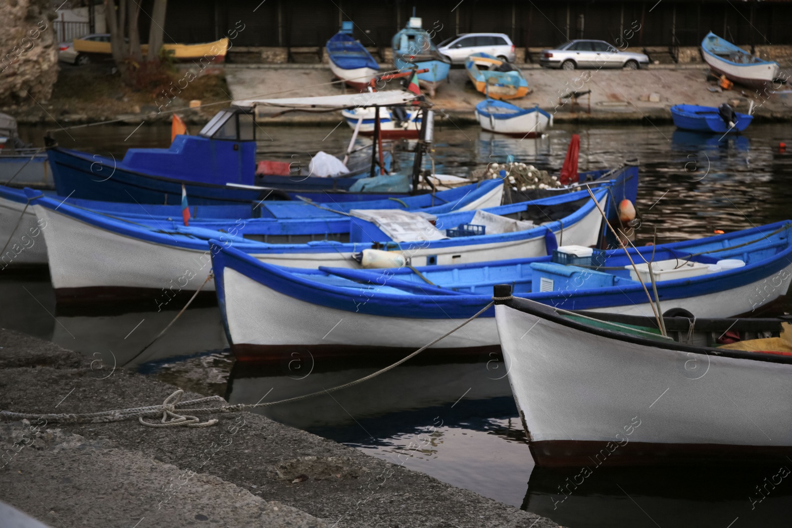 Photo of Beautiful view of river with moored boats at sunset