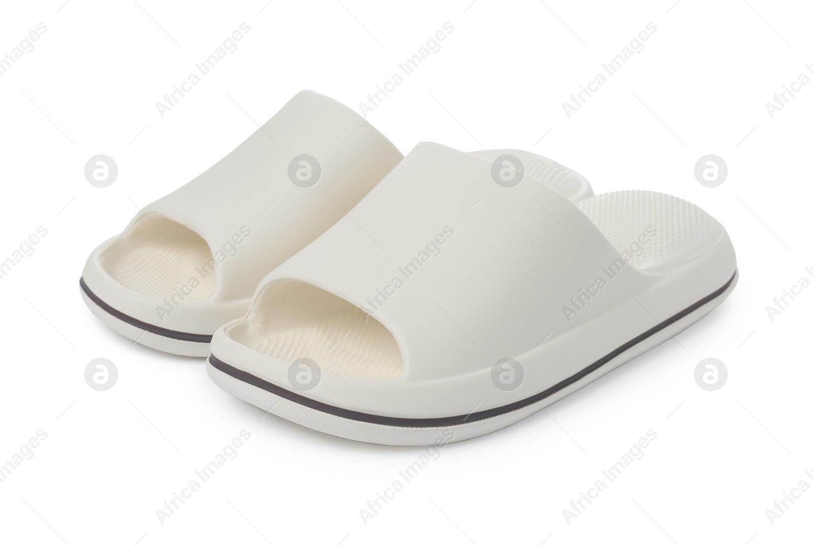 Photo of Pair of rubber slippers isolated on white