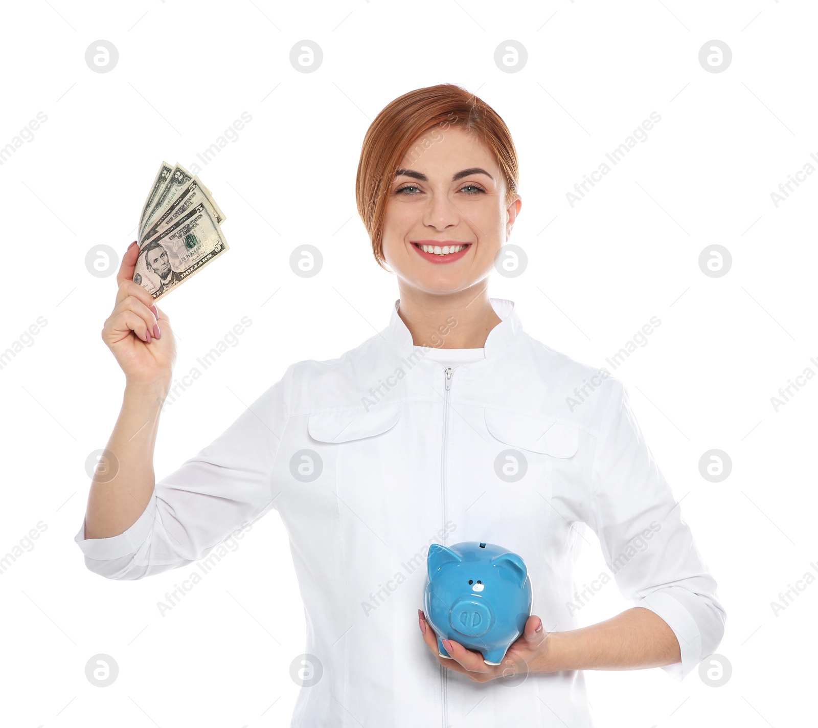 Photo of Portrait of female doctor with piggy bank and money on white background