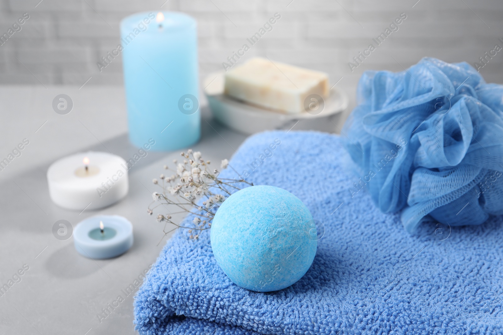 Photo of Beautiful composition with aromatic bath bomb on grey table