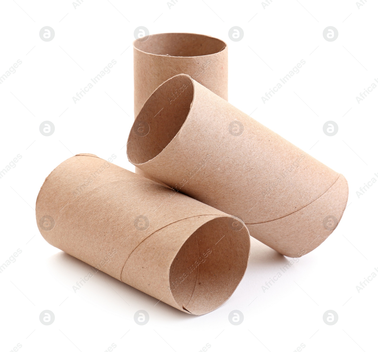 Photo of Empty paper toilet rolls on white background