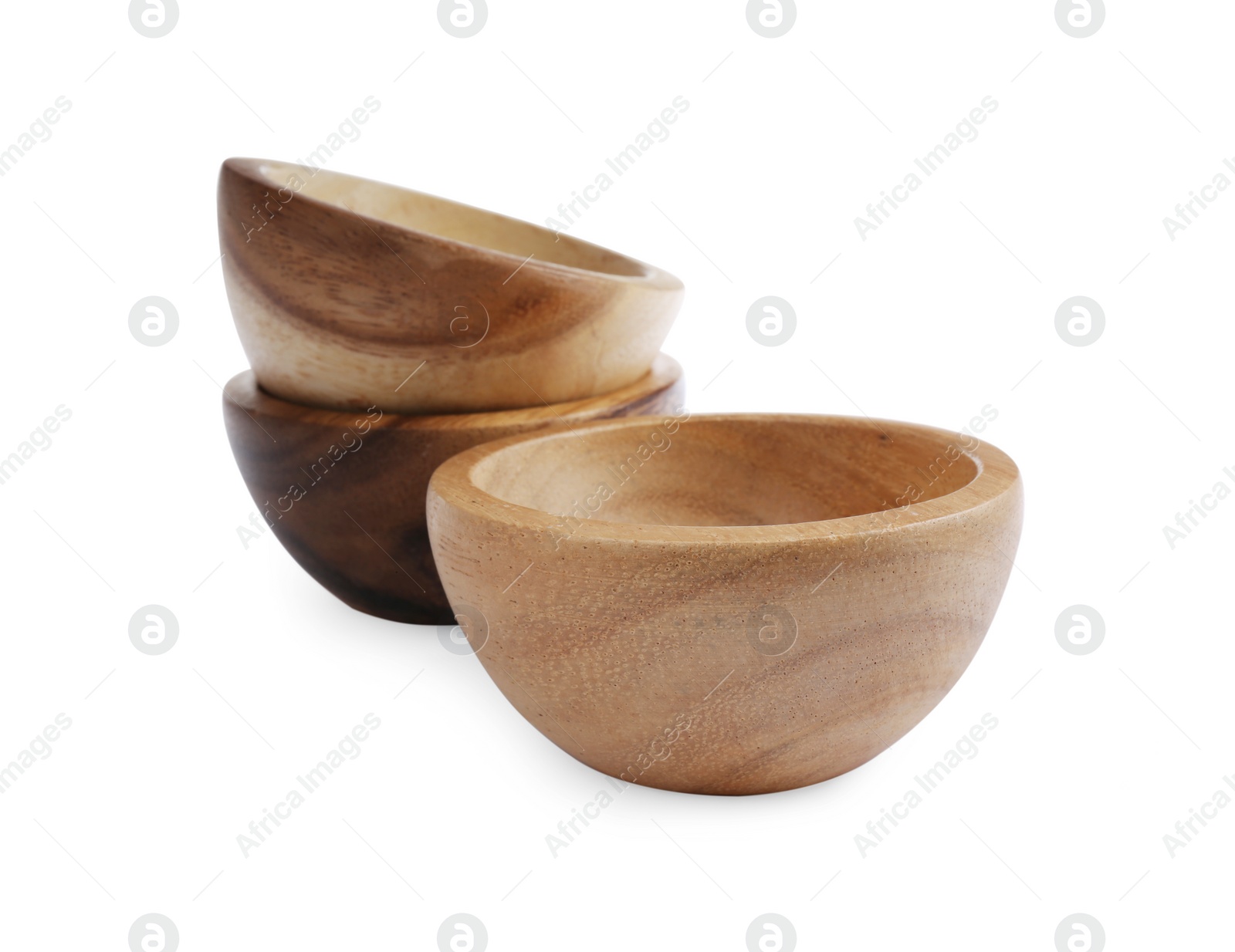 Photo of Set of wooden bowls on white background