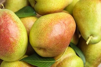 Photo of Many ripe juicy pears as background, closeup