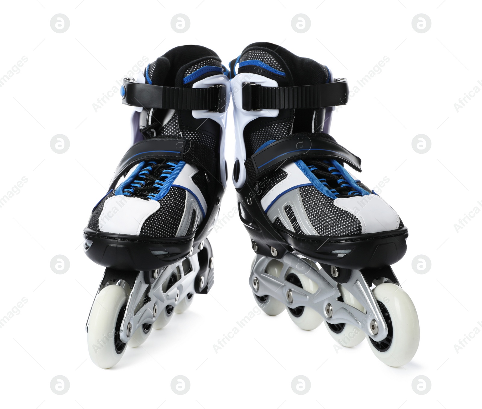 Photo of Pair of inline roller skates on white background