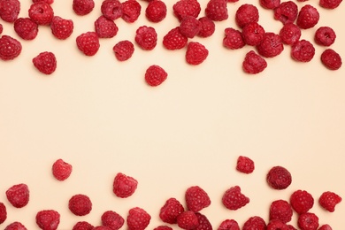 Photo of Flat lay composition with ripe aromatic raspberries on color background