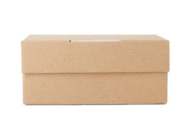 Photo of One closed cardboard box isolated on white