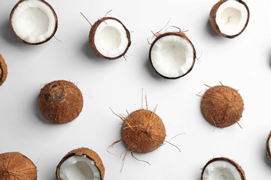 Photo of Coconut pattern on white background, top view