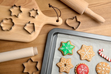 Photo of Composition with tasty colorful Christmas cookies on table, top view
