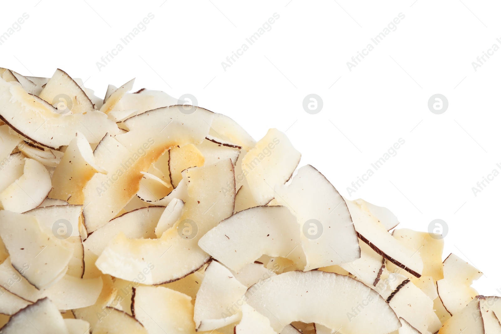 Photo of Pile of coconut chips isolated on white, top view
