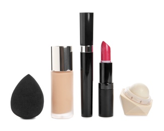 Set of makeup products on white background