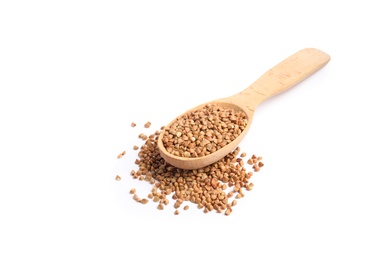 Photo of Spoon with uncooked buckwheat on white background