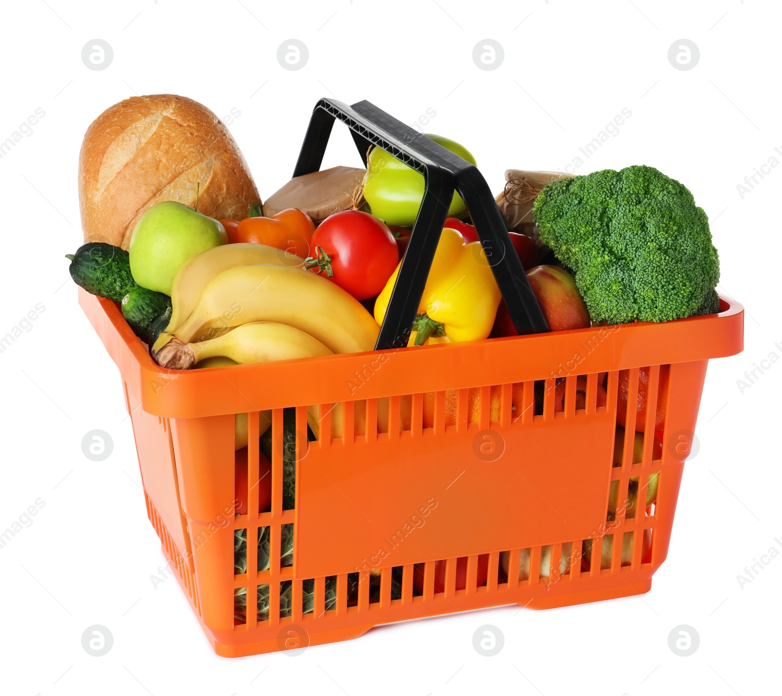 Photo of Shopping basket with grocery products on white background