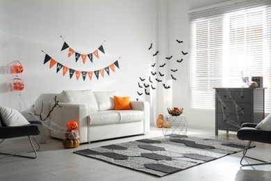 Modern room decorated for Halloween. Festive interior