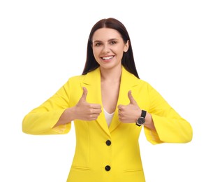 Photo of Beautiful happy businesswoman in yellow suit showing thumbs up on white background
