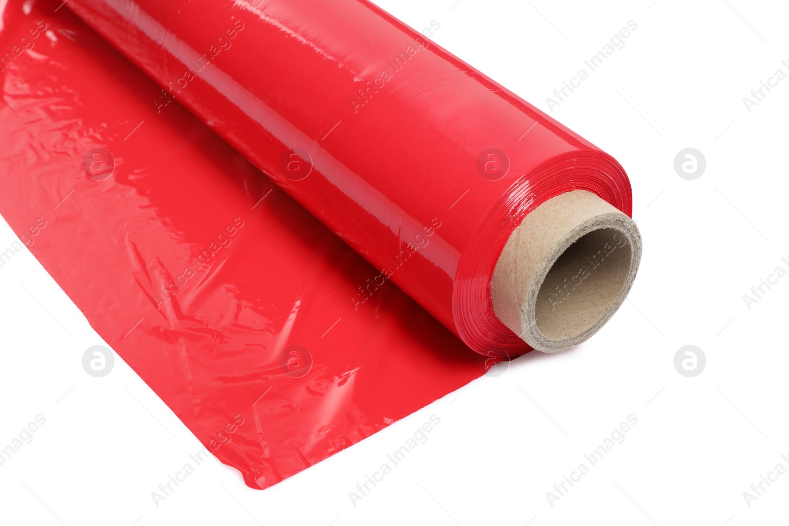 Photo of Roll of red plastic stretch wrap film isolated on white, closeup