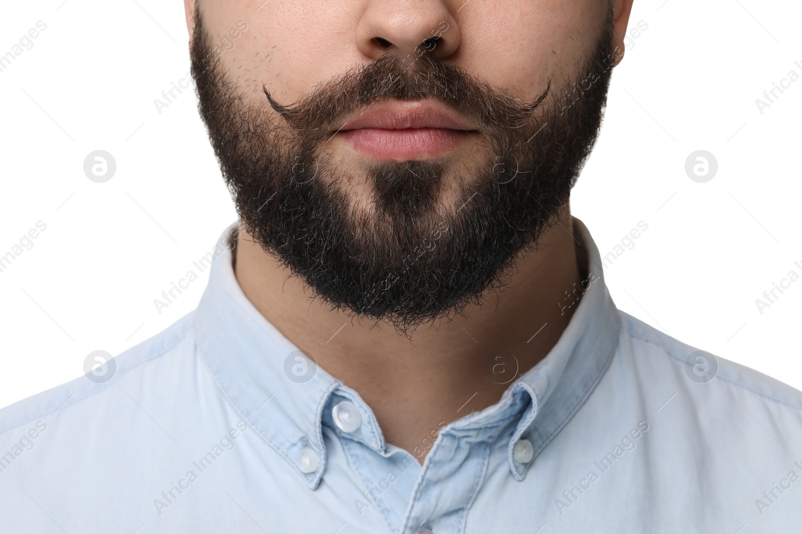 Photo of Young man with mustache on white background, closeup