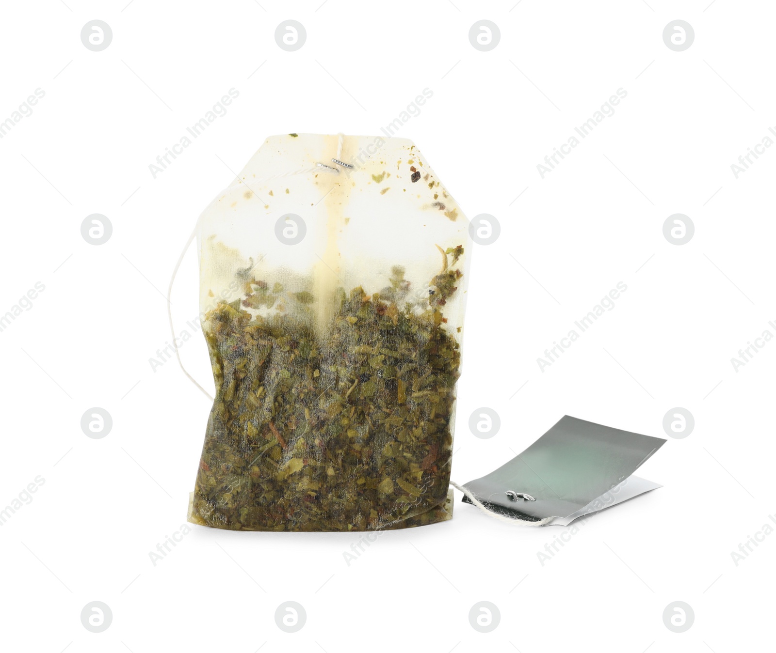 Photo of Used tea bag with tag isolated on white