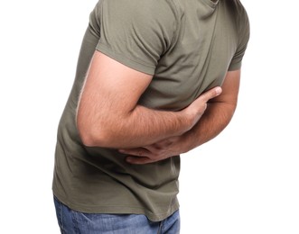 Photo of Man suffering from stomach pain on white background, closeup