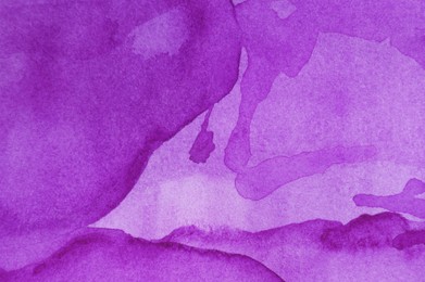 Photo of Abstract purple watercolor painting as background, top view