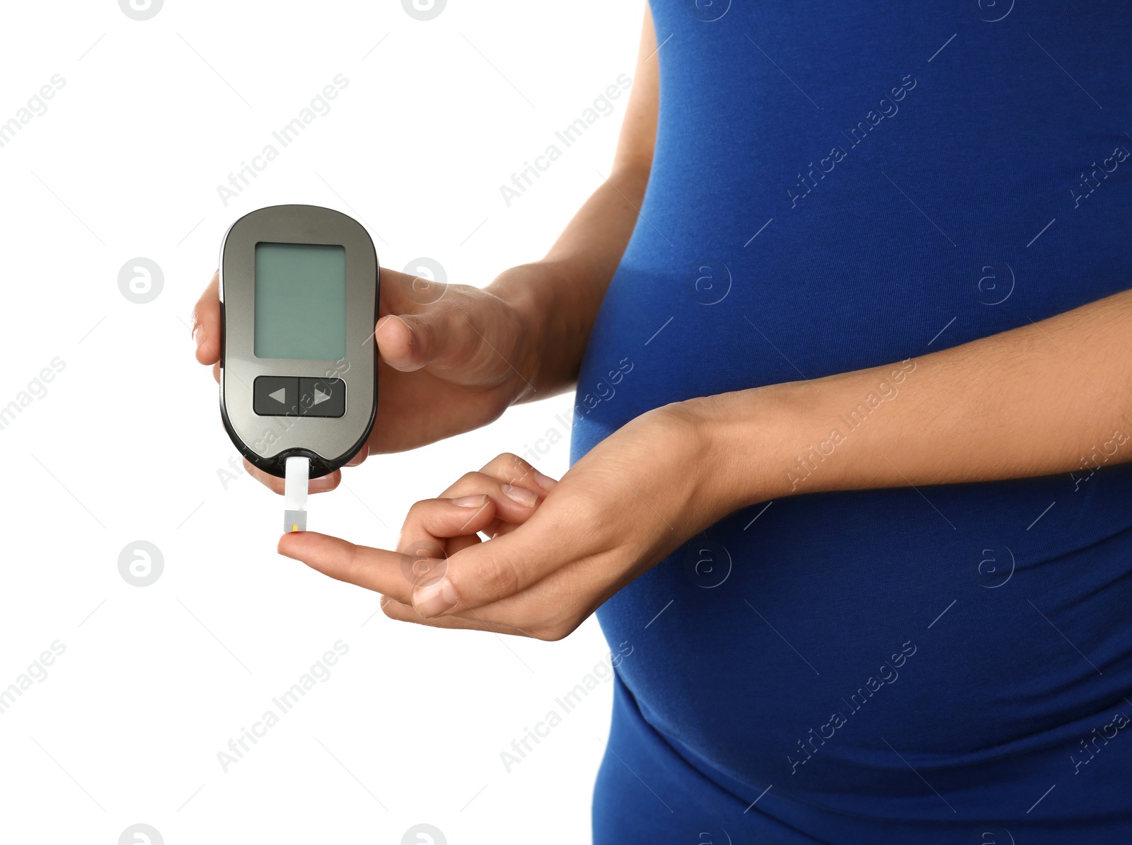 Photo of Pregnant woman checking blood sugar level with glucometer on white background. Diabetes test