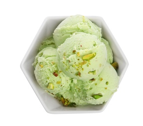 Photo of Bowl of delicious pistachio ice cream on white background, top view