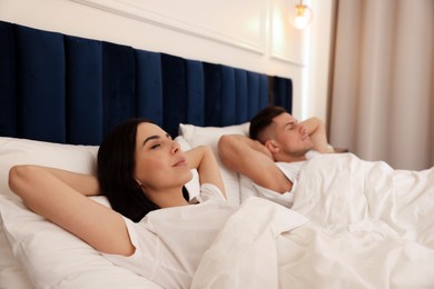 Photo of Lovely couple sleeping together in hotel room