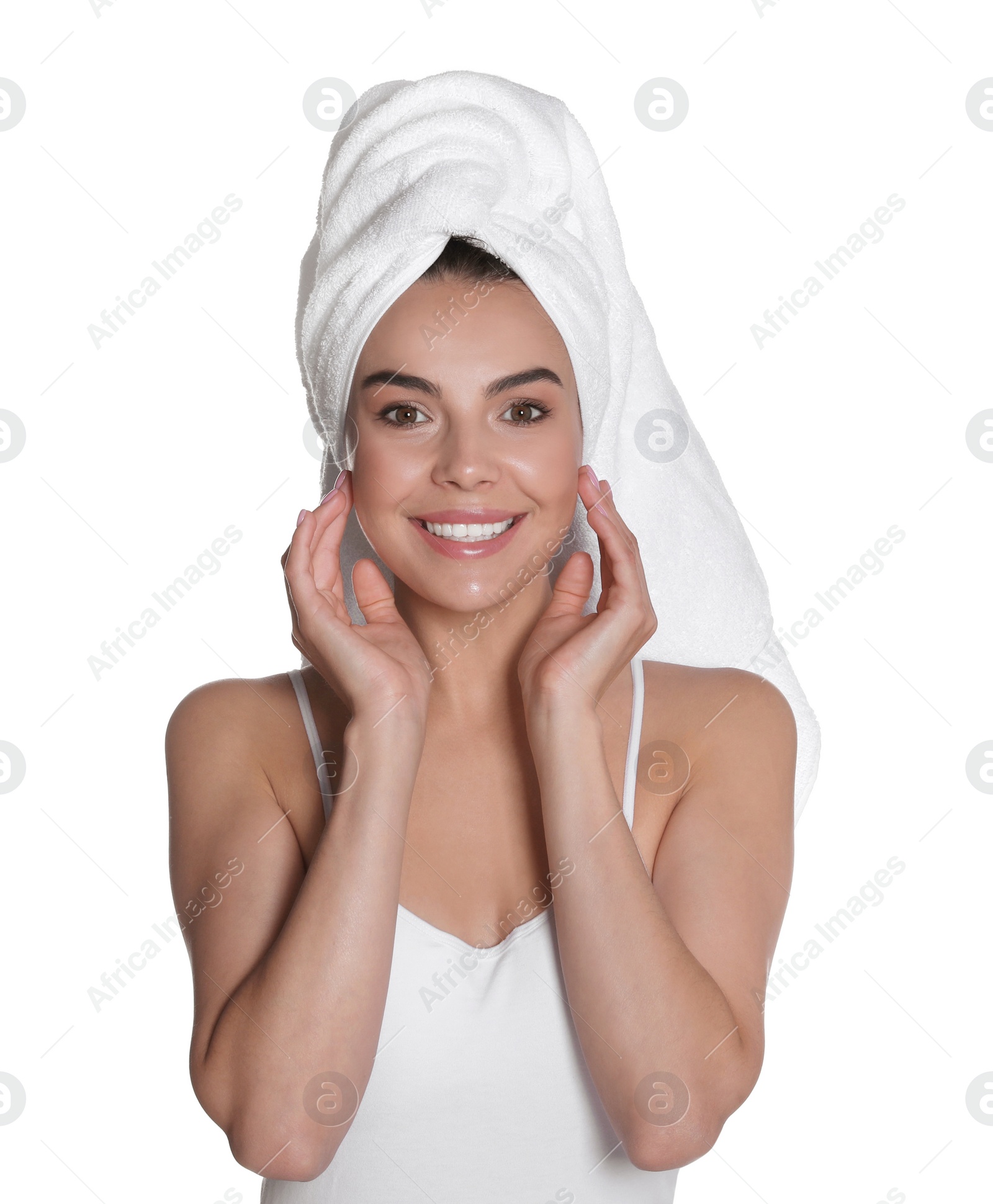 Photo of Beautiful young woman with towel on head against white background