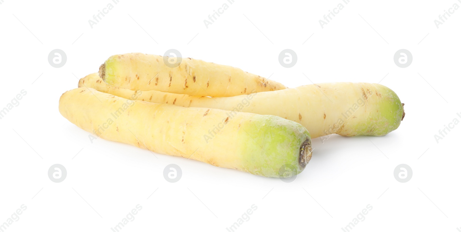 Photo of Whole fresh raw carrots isolated on white