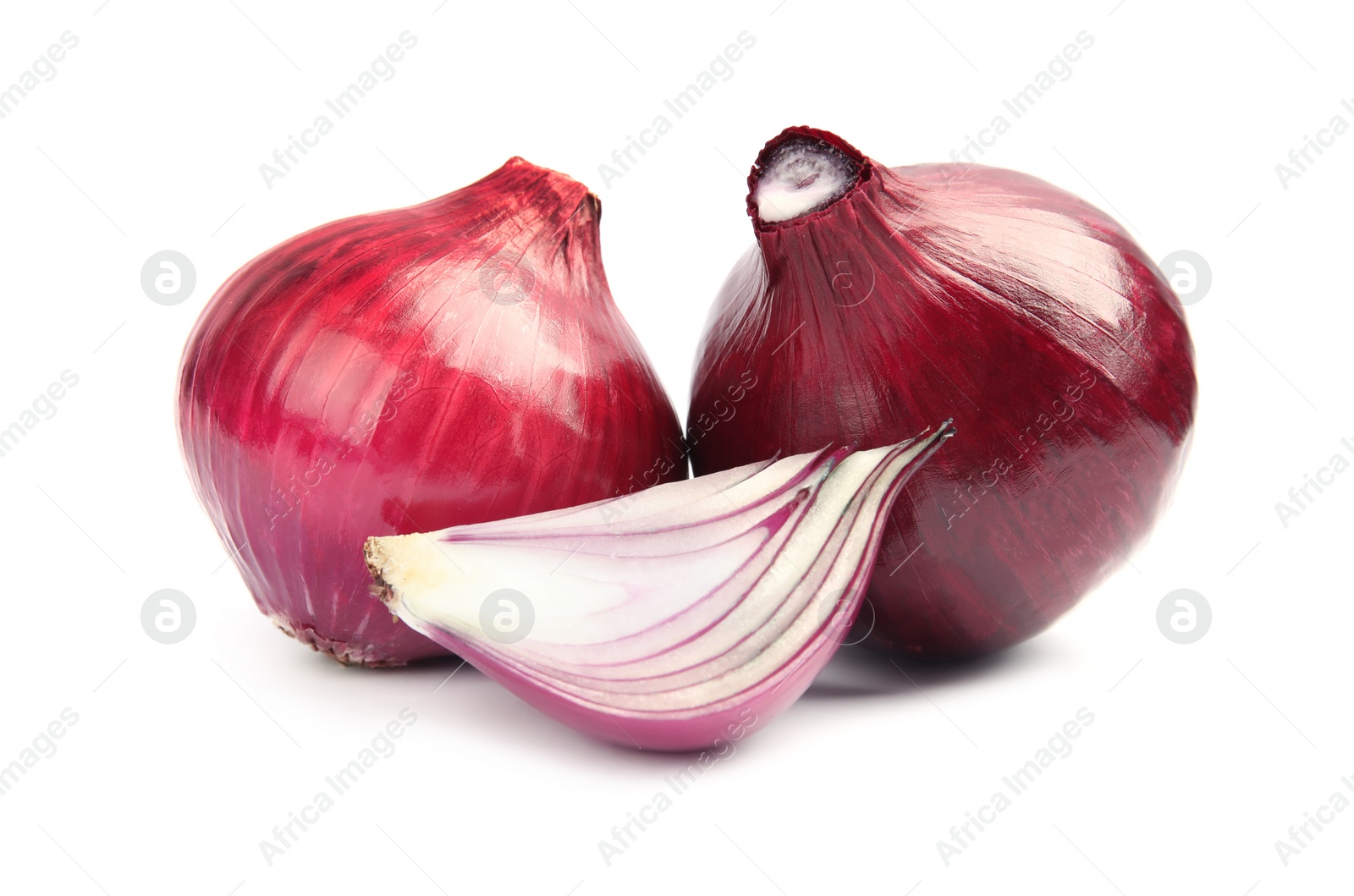 Photo of Ripe red onions on white background