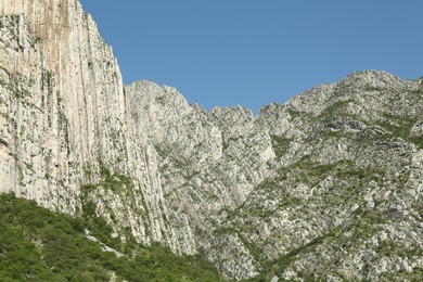 Photo of Picturesque landscape with high mountains under blue sky outdoors