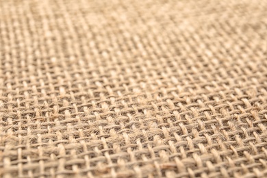 Photo of Texture of sustainable hemp fabric as background, closeup