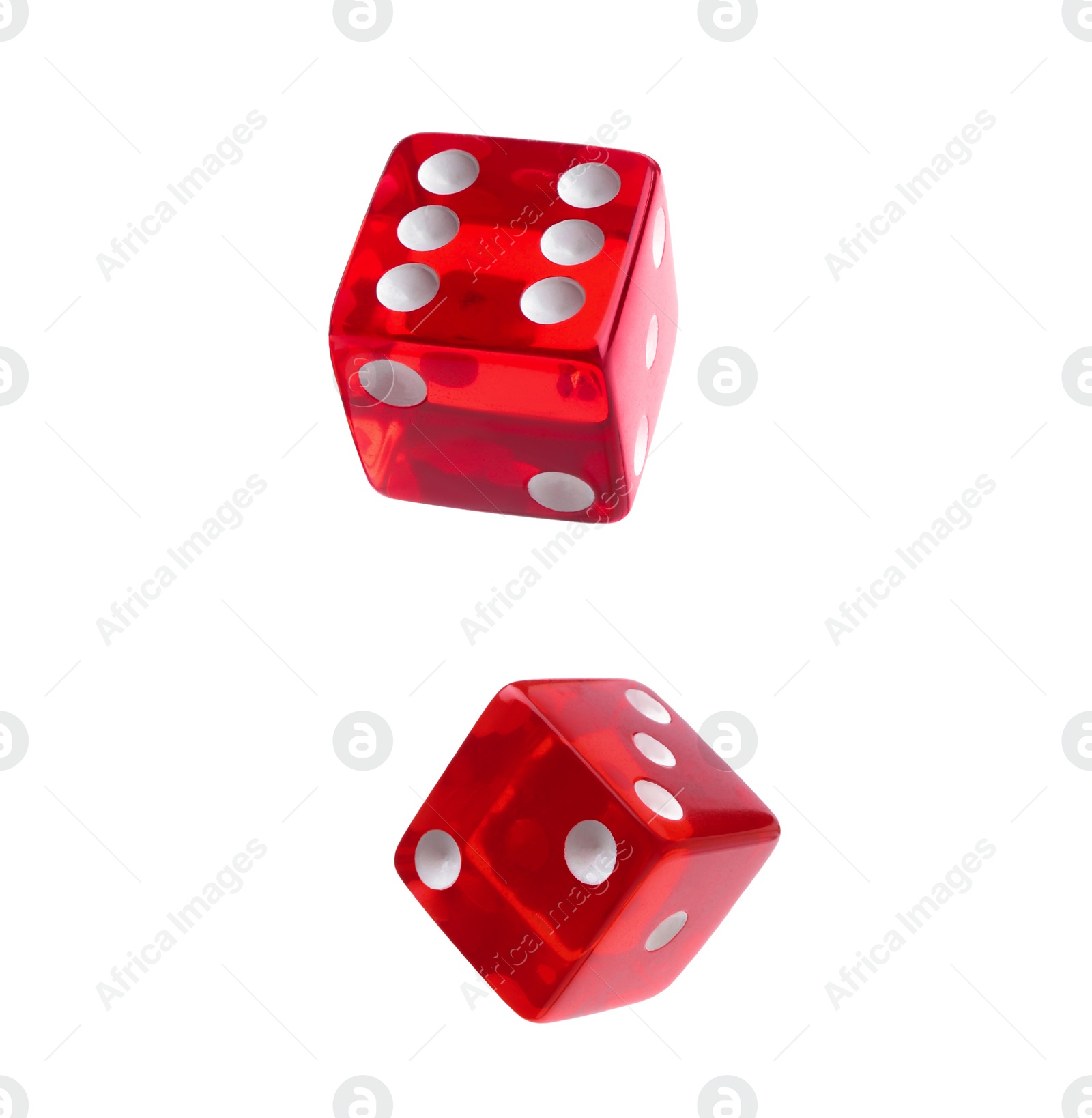 Image of Two red dice in air on white background