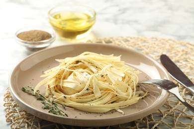 Photo of Fresh white carrot salad served on table, closeup