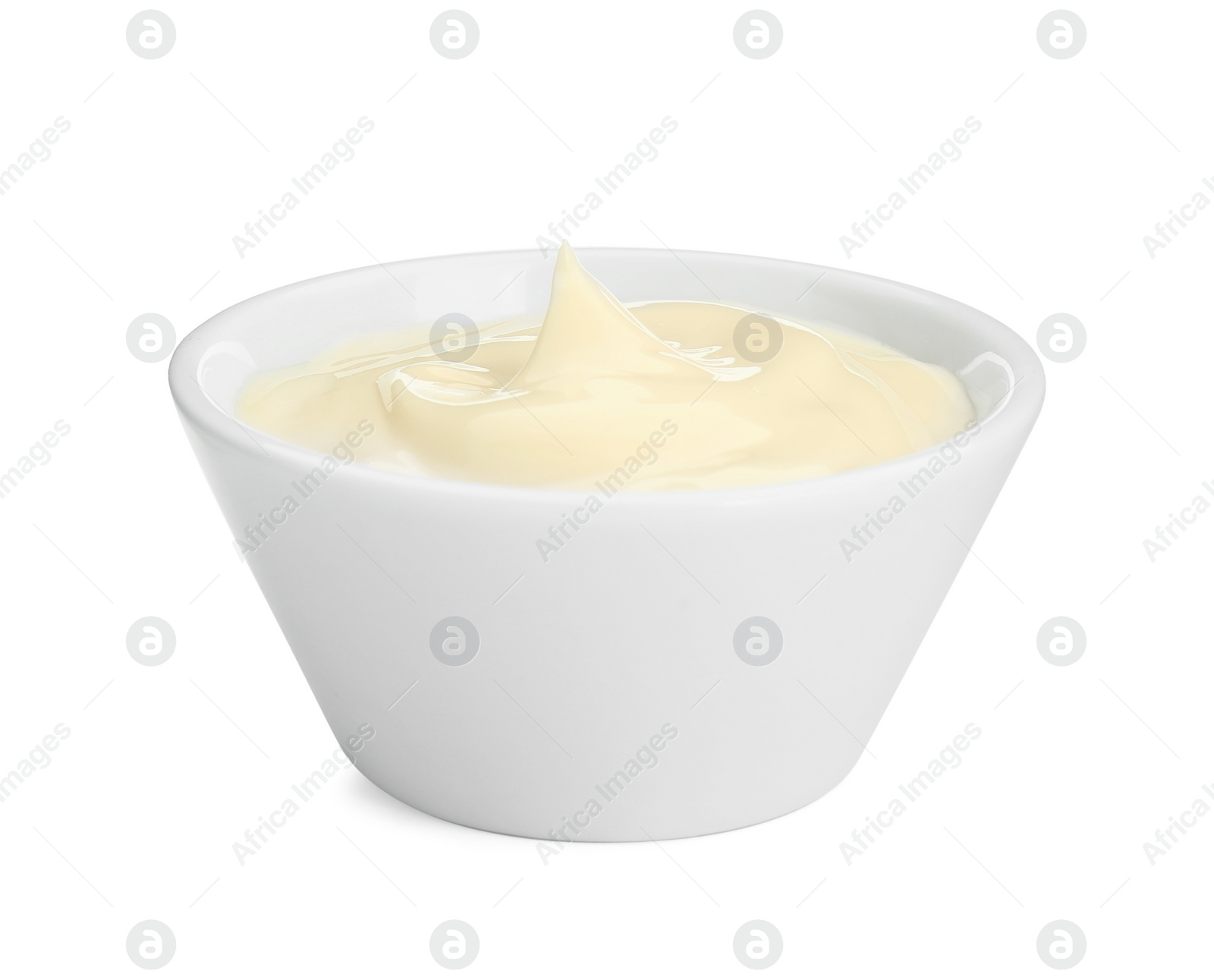 Photo of Fresh mayonnaise sauce in bowl isolated on white