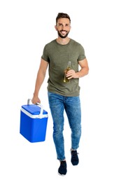 Photo of Happy man with cool box and bottle of beer on white background