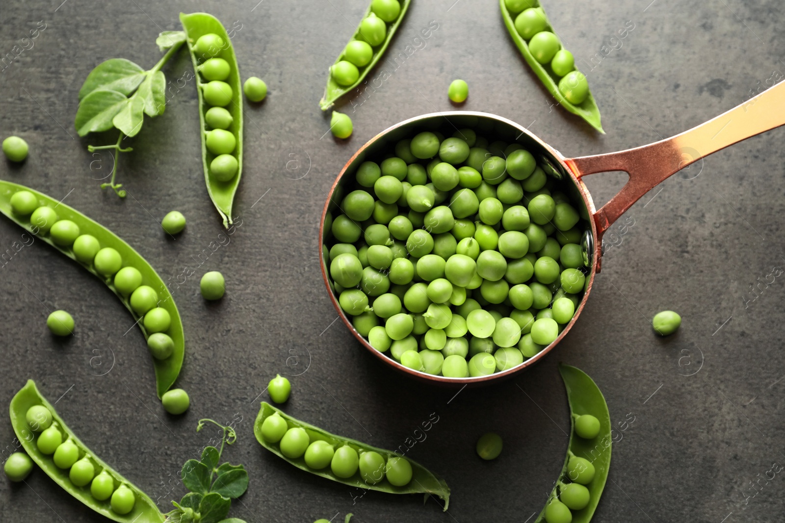 Photo of Flat lay composition with green peas on grey background