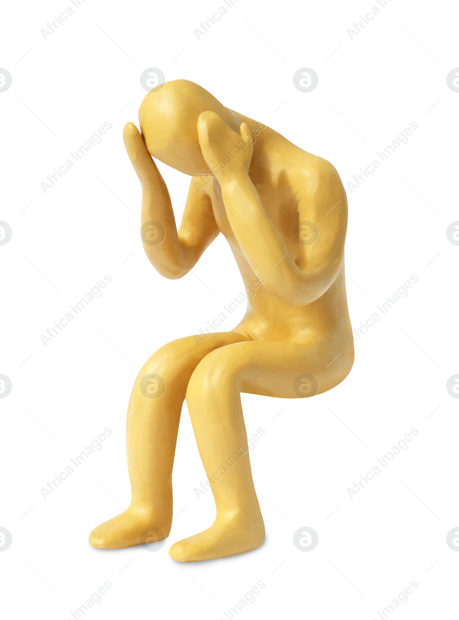 Photo of Plasticine figure of troubled human isolated on white