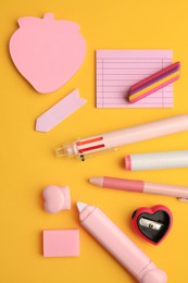 Flat lay composition with different school stationery on yellow background. Back to school