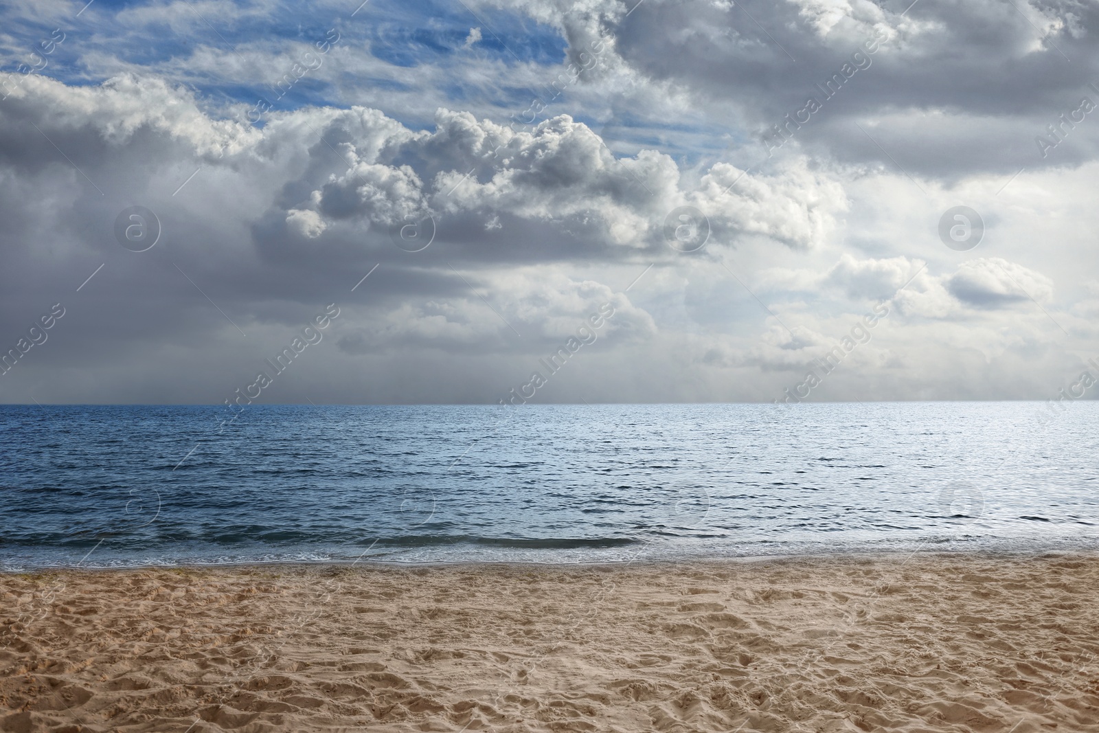 Image of Beautiful view of seascape and blue sky with white clouds