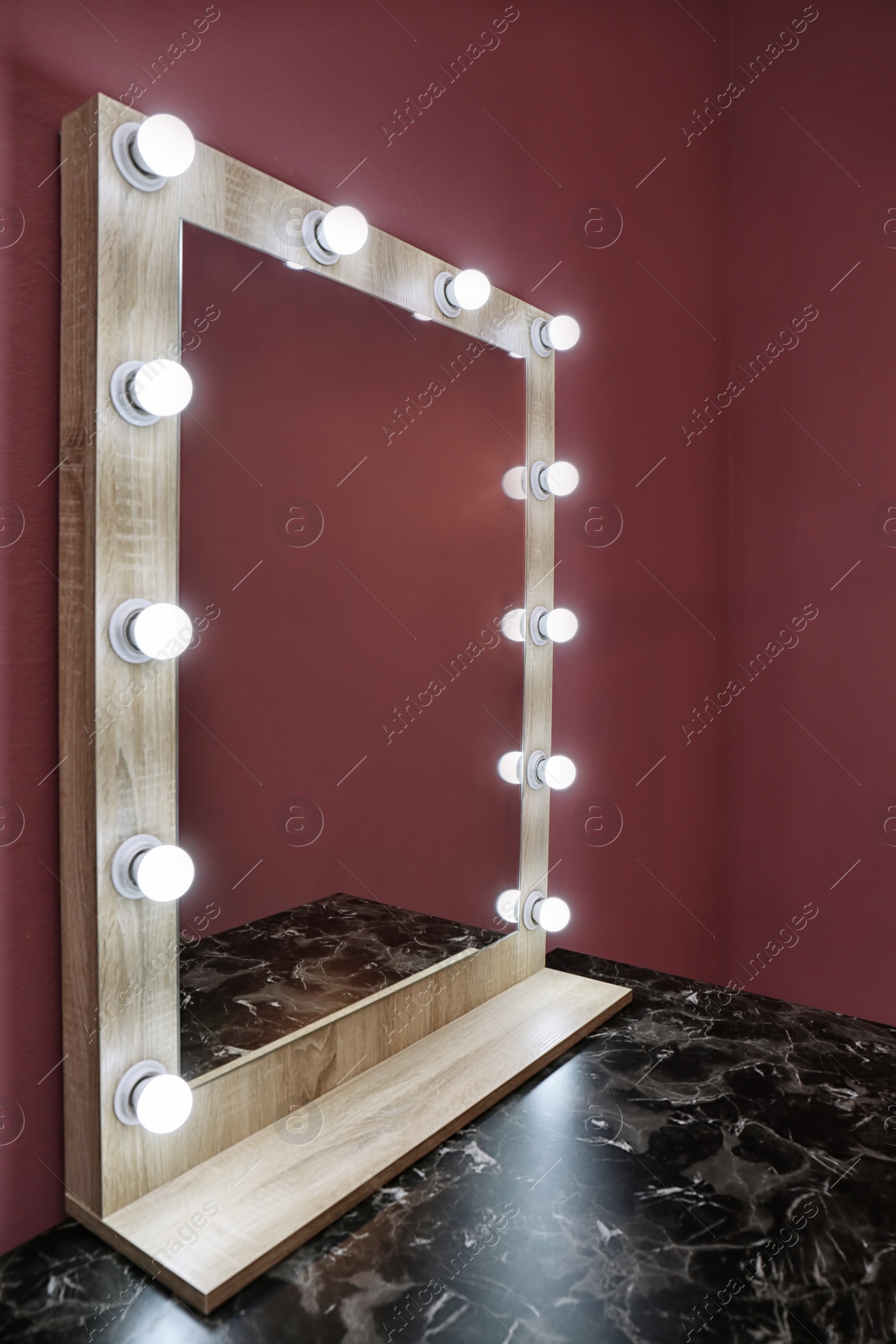 Photo of Beautiful mirror in modern makeup room