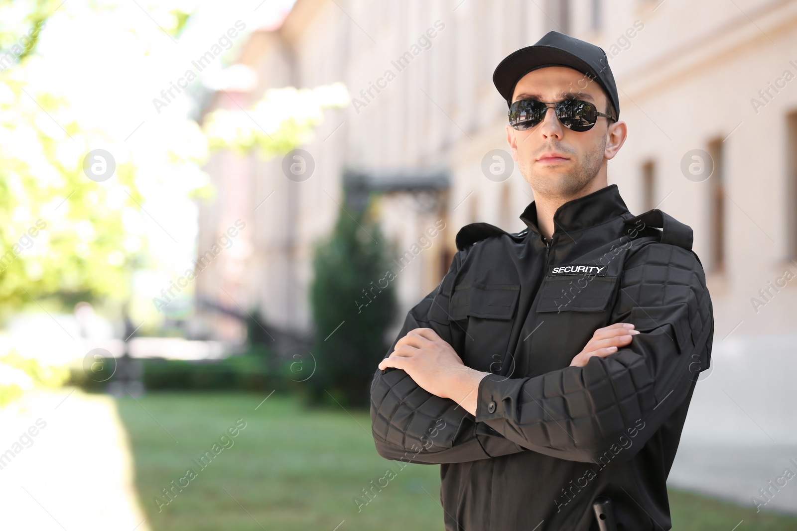 Photo of Portrait of male security guard in uniform outdoors