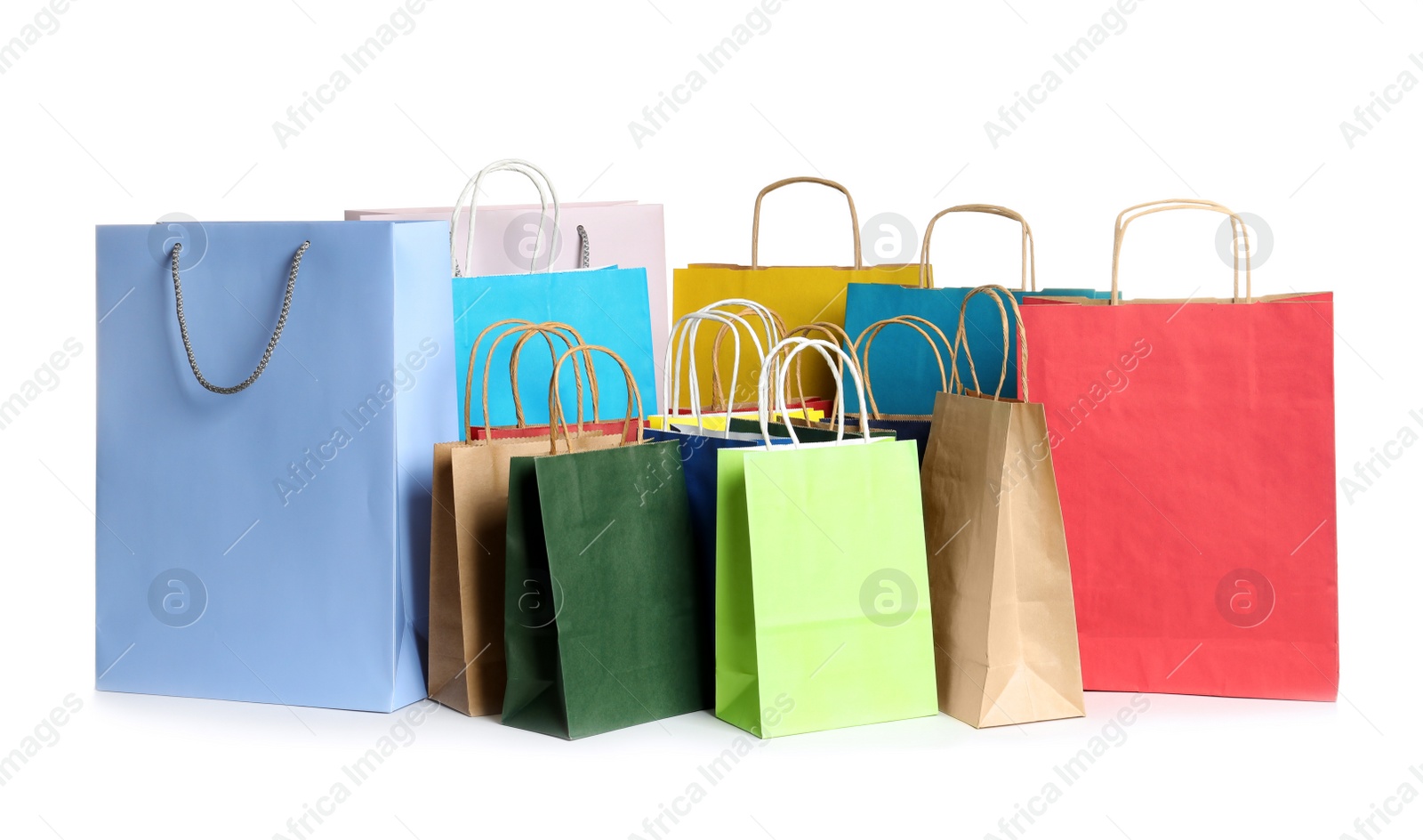 Photo of Colorful paper shopping bags on white background